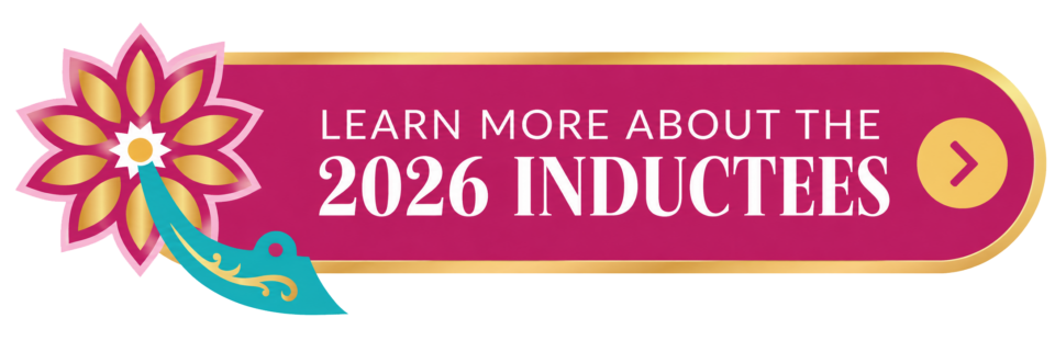A pink and gold banner with a flower graphic and the text Learn more about the 2026 inductees next to a gold arrow on the right.